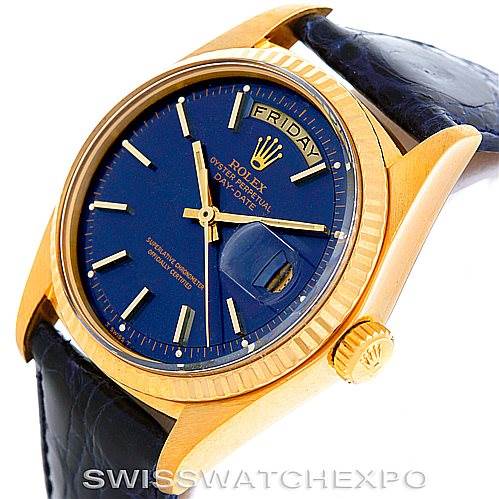 This is a close-up angle of a Rolex President 1803 Men's Yellow Gold Blue Dial 1803 Men's Yellow Gold Blue Dial model watch, showing the blue dial, day and date display, gold-tone case, and leather strap.