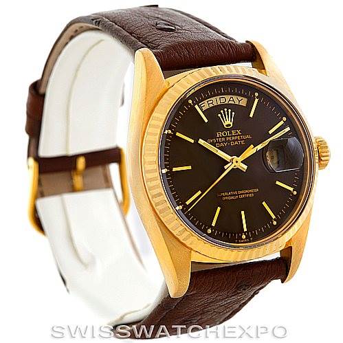 The image shows a Rolex President 1803 Men's Yellow Gold Brown Dial 1803 Men's Yellow Gold Brown Dial model watch in a side angle, highlighting its gold bezel, brown leather strap, and dial with date display.