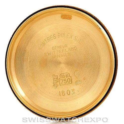 The image shows the inside case back of a Rolex President 1803 Men's Yellow Gold Brown Dial 1803 Men's Yellow Gold Brown Dial model watch, showcasing hallmark inscriptions and the reference number 1803.