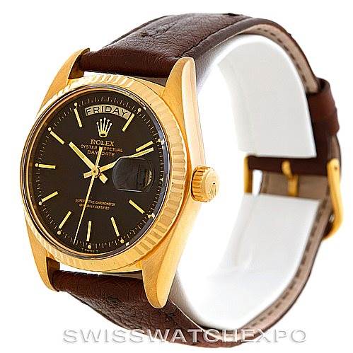 This image shows a Rolex President 1803 Men's Yellow Gold Brown Dial 1803 Men's Yellow Gold Brown Dial model watch angled to display the face, bezel, crown, and leather strap.