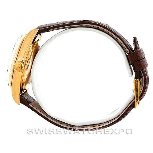 This side view of the Rolex President 1803 Men's Yellow Gold Brown Dial 1803 Men's Yellow Gold Brown Dial model watch shows the gold case, crown, and brown leather strap.