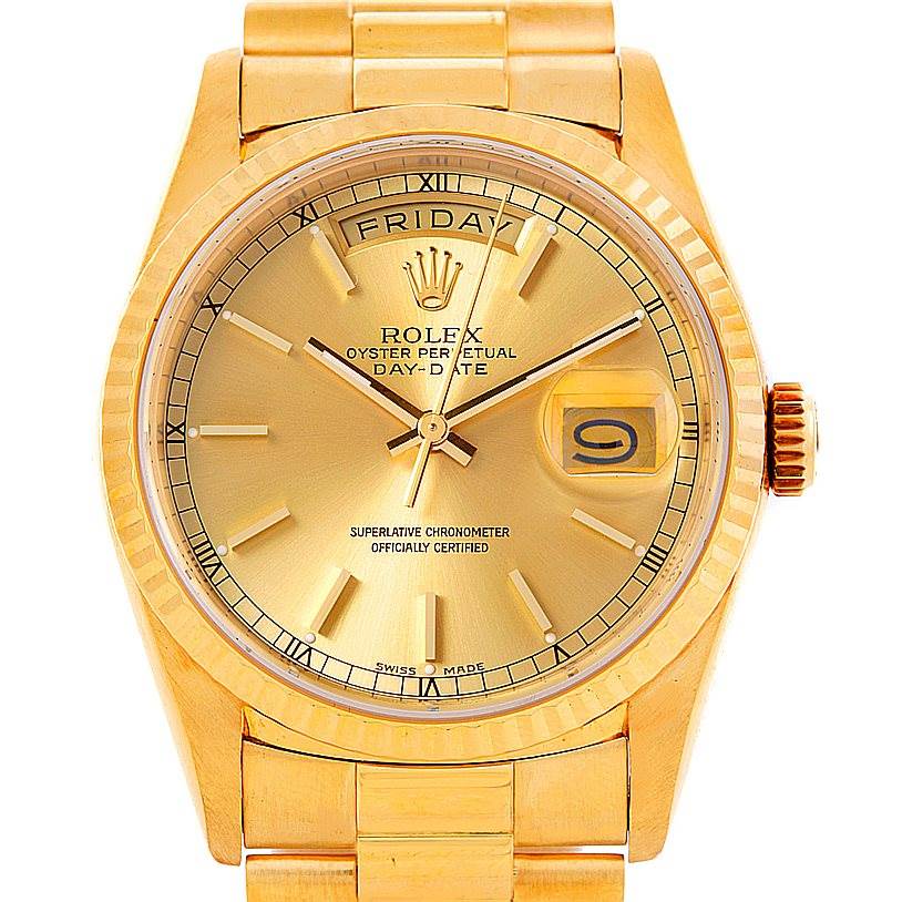 The Rolex President 18238 Men
s Yellow Gold Champagne Dial 18238 Men
s Yellow Gold Champagne Dial model watch is shown from a top-down angle, displaying its gold face, day-date window, and fluted bezel.