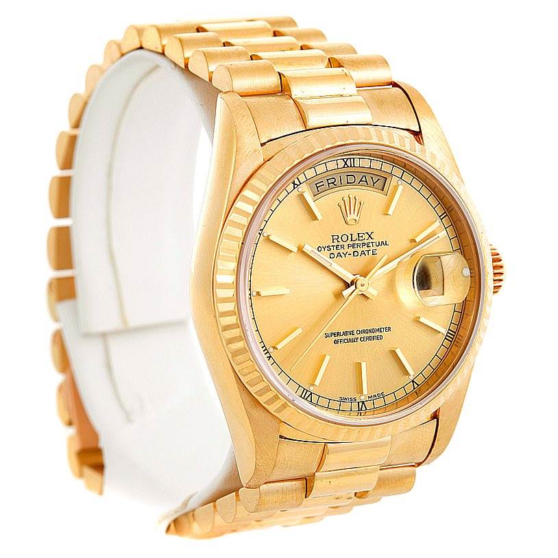 The image shows a side view of the Rolex President 18238 Men
s Yellow Gold Champagne Dial 18238 Men
s Yellow Gold Champagne Dial model, highlighting its gold bracelet, fluted bezel, and day-date dial.