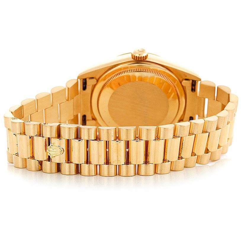 This image shows the back and bracelet of a Rolex President 18238 Men
s Yellow Gold Champagne Dial 18238 Men
s Yellow Gold Champagne Dial model watch in gold.