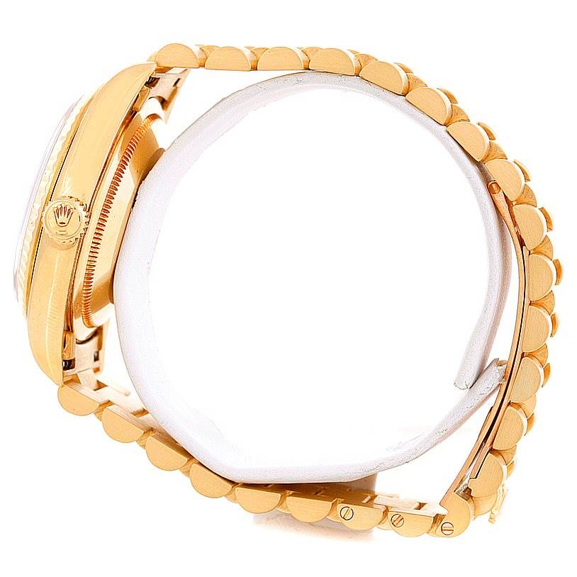 This side-angle image shows the Rolex President 18238 Men
s Yellow Gold Champagne Dial 18238 Men
s Yellow Gold Champagne Dial model, highlighting its gold case, crown, and bracelet.