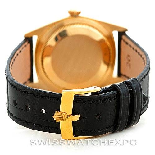 The image shows the back view of a Rolex President 18238 Men's Yellow Gold Grey Dial 18238 Men's Yellow Gold Grey Dial watch, highlighting the caseback and leather strap with a gold clasp.