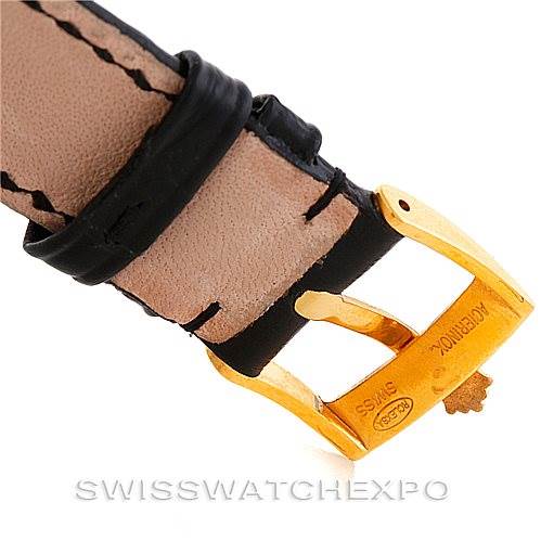 This image shows the buckle and strap of a Rolex President 18238 Men's Yellow Gold Grey Dial 18238 Men's Yellow Gold Grey Dial model watch at an angle that focuses on the clasp and stitching details.