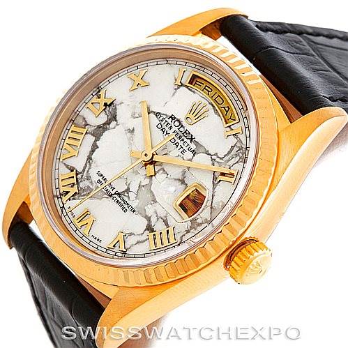 The image displays a side and front angle of a Rolex President 18238 Men's Yellow Gold Grey Dial 18238 Men's Yellow Gold Grey Dial model watch, showcasing its dial, bezel, crown, and part of the leather strap.