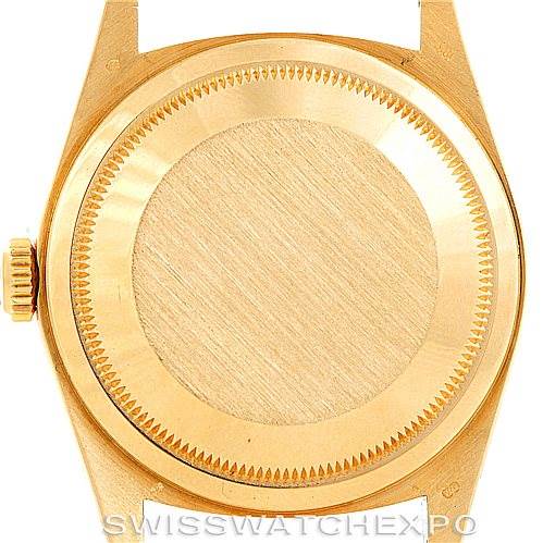 The image shows the back casing and crown of a Rolex President 18238 Men's Yellow Gold Black Dial 18238 Men's Yellow Gold Black Dial model watch.