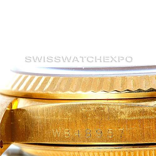 This image shows a close-up of the side profile and serial number of the Rolex President 18238 Men's Yellow Gold Black Dial 18238 Men's Yellow Gold Black Dial model watch.