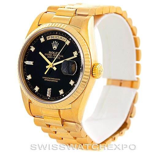 This is a Rolex President 18238 Men's Yellow Gold Black Dial 18238 Men's Yellow Gold Black Dial model watch shown at a three-quarter angle, displaying its gold case, bracelet, black dial, and day-date feature.