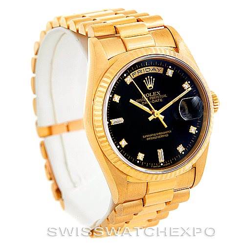 The image shows a Rolex President 18238 Men's Yellow Gold Black Dial 18238 Men's Yellow Gold Black Dial model watch, featuring a gold bracelet, black dial, and diamond hour markers.