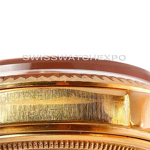 Close-up of the side view near the bezel of a Rolex President 1803 Men
s Yellow Gold Silver Dial 1803 Men
s Yellow Gold Silver Dial model, showcasing parts of the bezel and case.