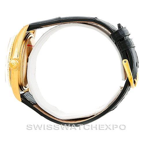 The image shows a side view of a Rolex President 1803 Men
s Yellow Gold Silver Dial 1803 Men
s Yellow Gold Silver Dial watch, highlighting the case, crown, and leather strap with a buckle.