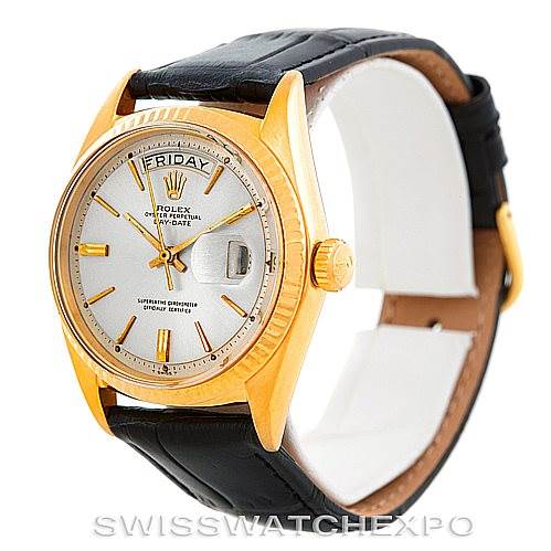 The image shows a Rolex President 1803 Men
s Yellow Gold Silver Dial 1803 Men
s Yellow Gold Silver Dial model watch at a three-quarter angle highlighting the face, bezel, crown, and leather strap.