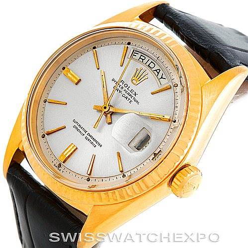 The image shows a Rolex President 1803 Men
s Yellow Gold Silver Dial 1803 Men
s Yellow Gold Silver Dial model watch at an angled view highlighting the dial, crown, and part of the strap.