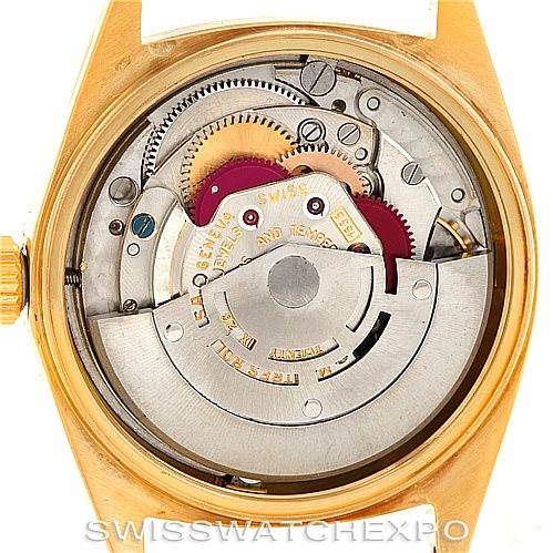 The image shows the back view of a Rolex President 1803 Men
s Yellow Gold Silver Dial 1803 Men
s Yellow Gold Silver Dial model watch, highlighting its internal mechanical components.