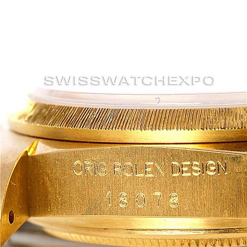 This image shows a close-up of the side case and bezel of the Rolex President 18078 Men
s Yellow Gold Champagne Dial 18078 Men
s Yellow Gold Champagne Dial model watch.