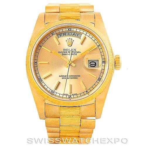 This is a frontal view of a Rolex President 18078 Men
s Yellow Gold Champagne Dial 18078 Men
s Yellow Gold Champagne Dial model, showing the dial, hands, date window, and bracelet.