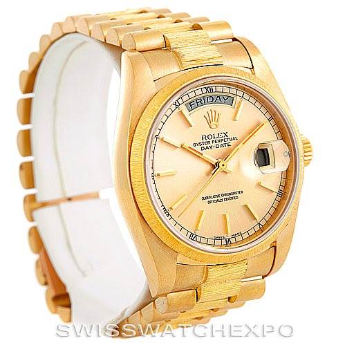 The image shows a Rolex President 18078 Men
s Yellow Gold Champagne Dial 18078 Men
s Yellow Gold Champagne Dial model watch from an angled front view, highlighting the dial, bezel, and part of the bracelet.