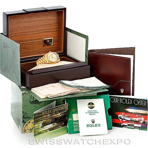 The image shows a Rolex President 18078 Men
s Yellow Gold Champagne Dial 18078 Men
s Yellow Gold Champagne Dial model watch along with its box, manuals, and accessories from a front angle.