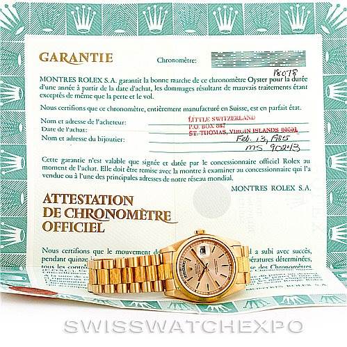 The image features a Rolex President 18078 Men
s Yellow Gold Champagne Dial 18078 Men
s Yellow Gold Champagne Dial model watch displayed in front of its warranty certificate.