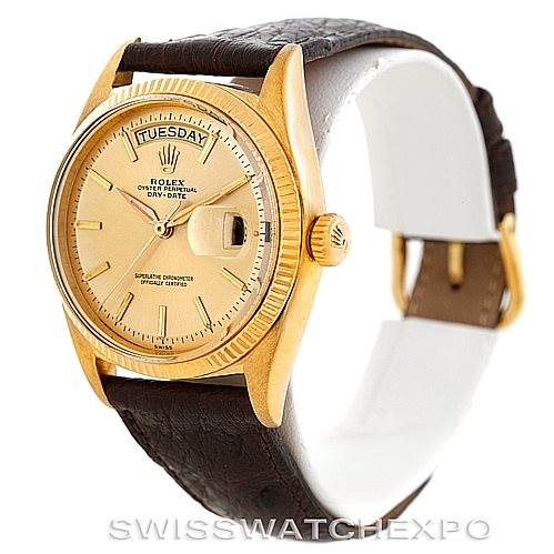 This image shows a Rolex President 1803 Men
s Yellow Gold Champagne Dial 1803 Men
s Yellow Gold Champagne Dial model watch from a front angle, highlighting its dial, bezel, and leather strap.