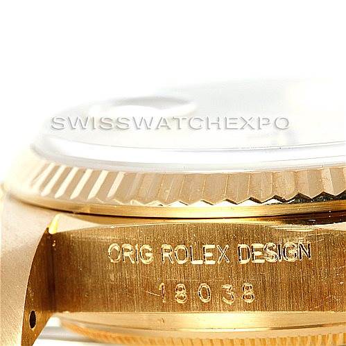The image shows a close-up of the Rolex President 18038 Men
s Yellow Gold Champagne Dial 18038 Men
s Yellow Gold Champagne Dial model side case, including the model number engraving.