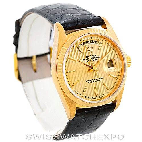 This image shows a Rolex President 18038 Men
s Yellow Gold Champagne Dial 18038 Men
s Yellow Gold Champagne Dial model watch angled to display the dial, bezel, crown, and leather strap.