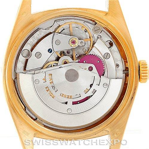 The image shows the internal mechanical movement of a Rolex President 18078 Men
s Yellow Gold Champagne Dial 18078 Men
s Yellow Gold Champagne Dial model watch, viewed from the back.