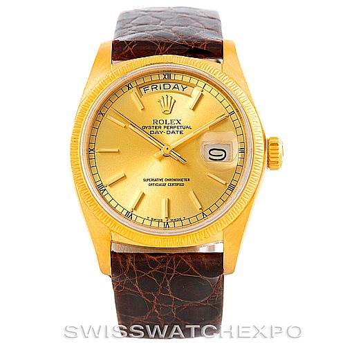 The image shows a front view of the Rolex President 18078 Men
s Yellow Gold Champagne Dial 18078 Men
s Yellow Gold Champagne Dial Day-Date watch, featuring its yellow gold case, brown leather strap, and gold dial.