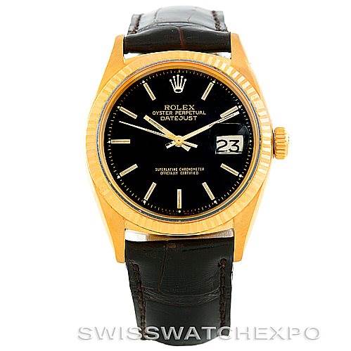 The image shows a front view of a Rolex President 1601 Men's Yellow Gold Black Dial 1601 Men's Yellow Gold Black Dial model watch with a gold case, black dial, date display, and leather strap.