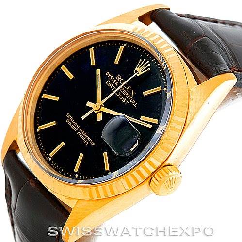 This image shows a Rolex President 1601 Men's Yellow Gold Black Dial 1601 Men's Yellow Gold Black Dial model watch at an angled top view, highlighting the dial, bezel, crown, and leather strap.