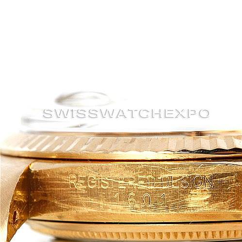 This image shows a close-up side view of a Rolex President 1601 Men's Yellow Gold Black Dial 1601 Men's Yellow Gold Black Dial model, highlighting the engraved details on the case side.