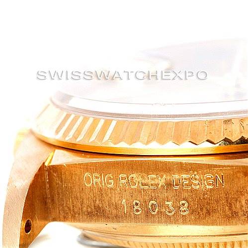 The image shows a close-up of the Rolex President 18038 Men
s Yellow Gold Champagne Dial 18038 Men
s Yellow Gold Champagne Dial model watch, highlighting its engraved reference number 18038 and the bezel.