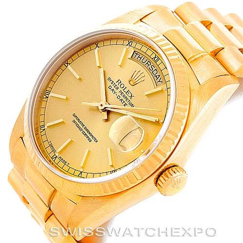 The image shows a gold Rolex President 18038 Men
s Yellow Gold Champagne Dial 18038 Men
s Yellow Gold Champagne Dial model watch from an angled view displaying the dial, bracelet, and crown.