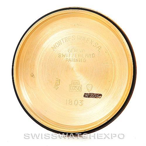The image shows the interior of a Rolex President 1803 Men's Yellow Gold White Dial 1803 Men's Yellow Gold White Dial model watch case back, with engraved details.