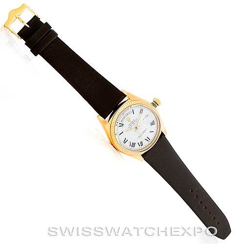 The image shows the Rolex President 1803 Men's Yellow Gold White Dial 1803 Men's Yellow Gold White Dial model watch from a top-down angle, displaying the face, case, crown, and full leather strap.