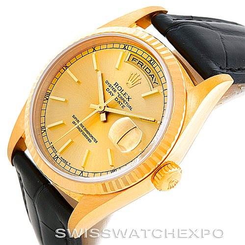 The image shows a Rolex President 18238 Men
s Yellow Gold Champagne Dial 18238 Men
s Yellow Gold Champagne Dial model watch at an angled upper view, highlighting the gold case, dial, crown, and leather strap.
