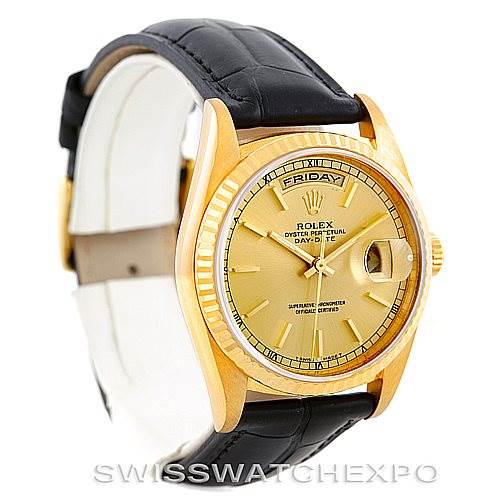 The Rolex President 18238 Men
s Yellow Gold Champagne Dial 18238 Men
s Yellow Gold Champagne Dial model watch is shown at an angled view, highlighting its gold case, dial, and black leather strap.