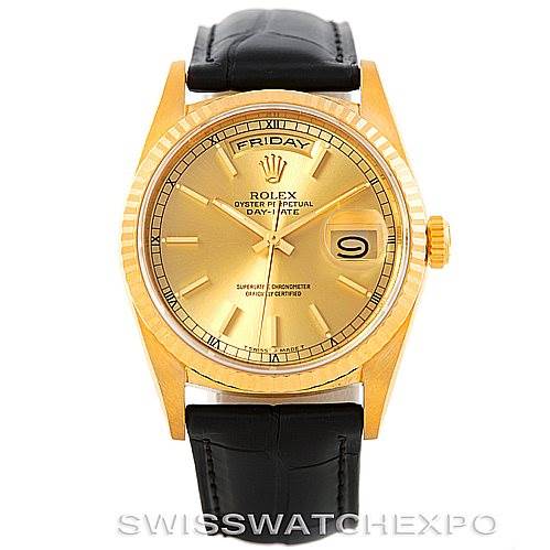 This image shows a frontal view of the Rolex President 18238 Men
s Yellow Gold Champagne Dial 18238 Men
s Yellow Gold Champagne Dial model watch, highlighting its gold bezel, gold dial, and black leather strap.