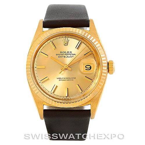 This is a front angle view of a Rolex President 1601 Men
s Yellow Gold Champagne Dial 1601 Men
s Yellow Gold Champagne Dial model watch, showing the dial, bezel, case, strap, and date window.