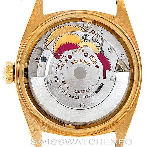 This image shows the internal mechanics and movement of a Rolex President 1601 Men
s Yellow Gold Champagne Dial 1601 Men
s Yellow Gold Champagne Dial model watch from a back angle.