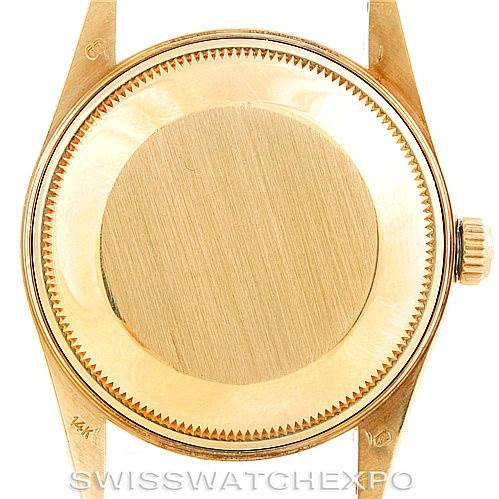 This is the back view of the Rolex President 15037 Men
s Yellow Gold Champagne Dial 15037 Men
s Yellow Gold Champagne Dial model watch, showing its case back and crown.