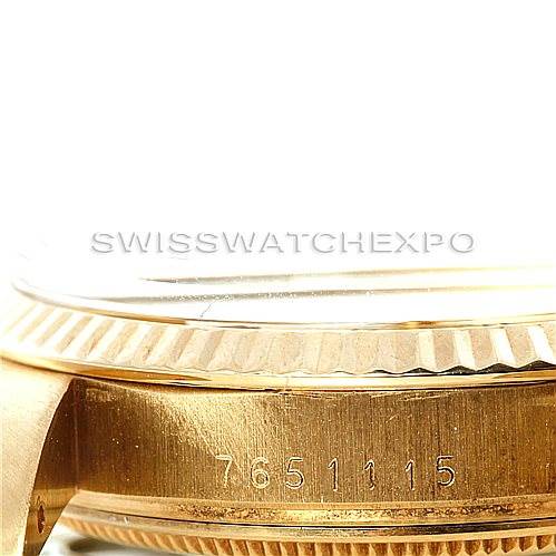 This image shows a close-up of the side of the Rolex President 15037 Men
s Yellow Gold Champagne Dial 15037 Men
s Yellow Gold Champagne Dial model, highlighting the serial number on its gold case.