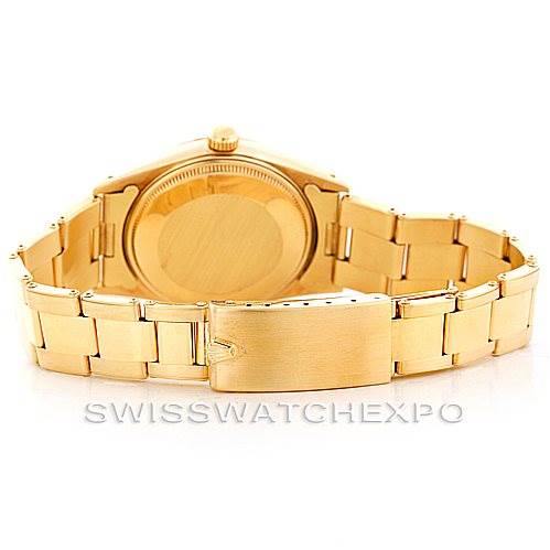The image shows the back case and bracelet of the Rolex President 15037 Men
s Yellow Gold Champagne Dial 15037 Men
s Yellow Gold Champagne Dial model watch, primarily focusing on the clasp and links.