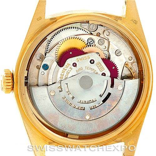 This image shows the intricate internal mechanism of a Rolex President 1601 Men
s Yellow Gold Champagne Dial 1601 Men
s Yellow Gold Champagne Dial model watch from a rear angle.