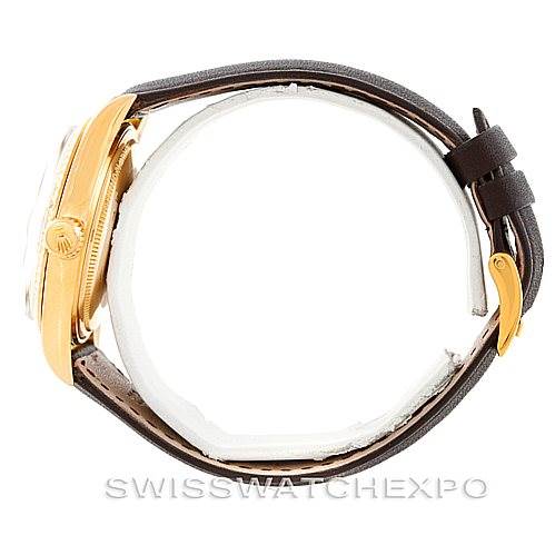 This image shows a side profile view of the Rolex President 1601 Men
s Yellow Gold Champagne Dial 1601 Men
s Yellow Gold Champagne Dial model watch, highlighting the case, crown, and leather strap.