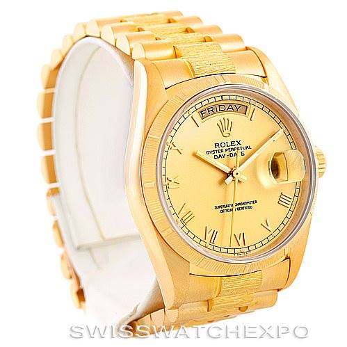 This image shows a Rolex President 18078 Men
s Yellow Gold Champagne Dial 18078 Men
s Yellow Gold Champagne Dial model watch at a three-quarter angle, highlighting the bracelet, dial, and day-date display.