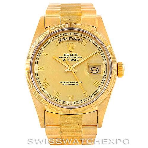 This image shows a frontal view of the Rolex President 18078 Men
s Yellow Gold Champagne Dial 18078 Men
s Yellow Gold Champagne Dial Oyster Perpetual Day-Date watch in yellow gold, displaying the face, bezel, crown, and part of the bracelet.
